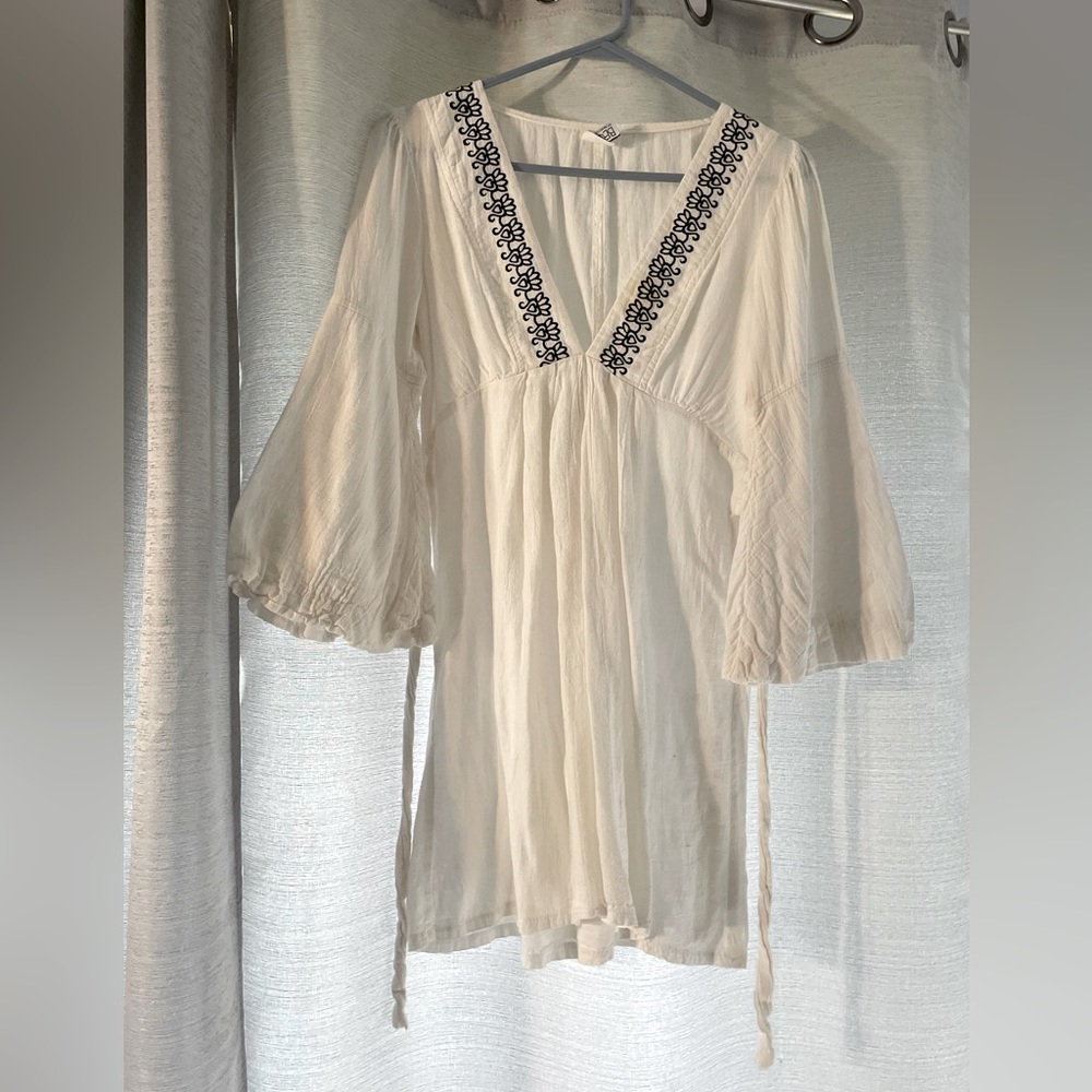 Light cover up or see through dress